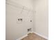 A simple laundry room with tile floors and hookups for washer and dryer at 199 Decatur Dr, Summerville, SC 29486