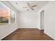 Bright, airy room showcasing hardwood floors, a modern ceiling fan, and a large window at 199 Decatur Dr, Summerville, SC 29486
