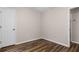 Bedroom features wood floors, a ceiling fan, and a closet at 202 Chandler Dr, Ladson, SC 29456