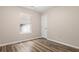 Bedroom features wood floors and a window for natural light at 202 Chandler Dr, Ladson, SC 29456