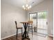 Cozy dining area with stylish furniture, perfect for casual meals or entertaining guests with natural lighting at 202 Chandler Dr, Ladson, SC 29456