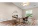 Bright living room showcasing a fireplace, hardwood floors, and natural lighting from the exterior at 202 Chandler Dr, Ladson, SC 29456