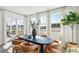Elegant dining room with a modern table, stylish chairs, and large windows providing ample natural light at 2050 Mcguire Ln # 13, Hollywood, SC 29449