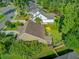 Aerial view of home and fenced backyard featuring a pool, patio, and lush landscaping offering a private outdoor space at 206 President Cir, Summerville, SC 29483
