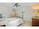 Spacious bedroom with a four-poster bed, TV, and side table at 206 President Cir, Summerville, SC 29483