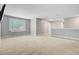 Large bonus room with neutral carpeting, good natural light, and a TV at 206 President Cir, Summerville, SC 29483