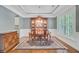Dining room features hardwood floors, classic decor, and plenty of space for Gathering gatherings at 206 President Cir, Summerville, SC 29483