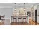 Stylish kitchen island with granite countertops and barstool seating, perfect for entertaining at 206 President Cir, Summerville, SC 29483