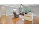 Inviting living room with hardwood floors, comfortable seating, and bright natural light at 206 President Cir, Summerville, SC 29483