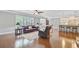 Bright and airy living room featuring hardwood floors, comfortable seating, and great natural light at 206 President Cir, Summerville, SC 29483