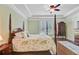 Light-filled main bedroom featuring a decorative bed frame, and hardwood floors at 206 President Cir, Summerville, SC 29483