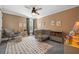 Cozy bedroom with a crib, rocking chair, playful decor, and area rug at 2234 Kemmerlin St, Johns Island, SC 29455