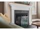 Modern fireplace with a custom decorative screen in a neutral living room at 2234 Kemmerlin St, Johns Island, SC 29455
