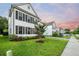Beautifully landscaped front yard showcasing a well-maintained lawn and mature trees at 2234 Kemmerlin St, Johns Island, SC 29455