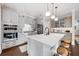 Modern kitchen with stainless steel appliances, a large center island, and barstool seating at 2234 Kemmerlin St, Johns Island, SC 29455