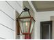 Close up of a lit lantern on the exterior of a house at 2234 Kemmerlin St, Johns Island, SC 29455