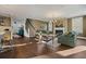 Spacious living room featuring hardwood floors and comfortable seating with staircase nearby at 2234 Kemmerlin St, Johns Island, SC 29455