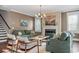 Bright living room featuring a fireplace, comfortable seating, and stylish decor at 2234 Kemmerlin St, Johns Island, SC 29455
