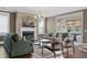 Bright living room featuring a fireplace, hardwood floors, and modern furnishings at 2234 Kemmerlin St, Johns Island, SC 29455