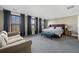 Expansive main bedroom boasts ample natural light, a sitting area, and neutral tones at 2234 Kemmerlin St, Johns Island, SC 29455