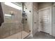 The shower features modern tile work, a glass door, and a rainfall showerhead, offering a spa-like experience at 2234 Kemmerlin St, Johns Island, SC 29455