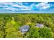 An aerial view of a neighborhood home in a lush area with a view of the sky at 2287 Shoreline Dr, Johns Island, SC 29455