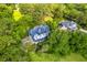 Aerial view of a neighborhood home with mature landscaping and lush green trees at 2287 Shoreline Dr, Johns Island, SC 29455