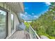 Balcony view showcasing the water view and dock, seamlessly blending indoor and outdoor living at 2287 Shoreline Dr, Johns Island, SC 29455