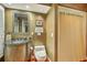 Well-lit bathroom boasts a vanity with a marble countertop and a separate shower at 2287 Shoreline Dr, Johns Island, SC 29455