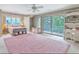 Bright bedroom with ample sunlight, a cozy chair, and a personal desk area at 2287 Shoreline Dr, Johns Island, SC 29455