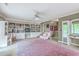 Spacious bedroom with built-in shelving and a cozy chair for relaxing or reading at 2287 Shoreline Dr, Johns Island, SC 29455