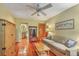 Charming bedroom featuring an adjoining bathroom, sofa, and ample storage space at 2287 Shoreline Dr, Johns Island, SC 29455
