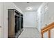 Hallway with cubbies and a staircase leading to other floors, blending functionality with design at 2287 Shoreline Dr, Johns Island, SC 29455