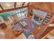 Grand living room with vaulted wood ceilings, fireplace, built-in bookshelves, and hardwood floors at 2287 Shoreline Dr, Johns Island, SC 29455
