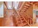 Wooden staircase provides access to the upper floors of this traditionally styled home at 2287 Shoreline Dr, Johns Island, SC 29455