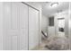 Upstairs hallway with carpet and featuring a large closet and an open doorway at 2505 Stadium Dr, North Charleston, SC 29406