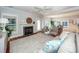 Open living room with fireplace, view of the kitchen and hardwood floors at 2517 Charter Oaks Dr, Mount Pleasant, SC 29466