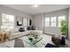 Stylish living room with a comfortable sectional sofa, modern decor, and ample natural light at 2703 Grange Cir, Summerville, SC 29486