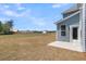 View of the home's backyard featuring a patio, a door to the house, and views of the neighborhood at 2807 Grange Cir, Summerville, SC 29486