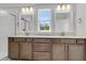 Bathroom boasts a double vanity and bright lighting at 2807 Grange Cir, Summerville, SC 29486