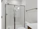 Modern bathroom with glass-enclosed shower, white subway tile, and bronze fixtures at 2807 Grange Cir, Summerville, SC 29486