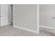 Neutral bedroom with plush carpeting and open access to a walk-in closet at 2807 Grange Cir, Summerville, SC 29486
