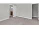 Cozy bedroom with carpet flooring and views to bath and walk in closet at 2807 Grange Cir, Summerville, SC 29486
