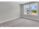 Bright bedroom with neutral carpet and double windows overlooking the neighborhood at 2807 Grange Cir, Summerville, SC 29486