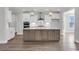 Stylish kitchen with a kitchen island, stainless steel appliances, and pendant lighting at 2807 Grange Cir, Summerville, SC 29486