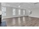 Spacious living room with hardwood floors, recessed lighting, and large windows at 2807 Grange Cir, Summerville, SC 29486
