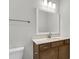 Bathroom with a brown vanity, white countertop and modern fixtures at 2807 Grange Cir, Summerville, SC 29486