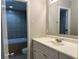 Well-lit bathroom with a vanity sink and a view of the relaxing bathtub at 2827 Haverhill Cir, North Charleston, SC 29420