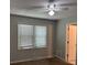Bedroom featuring a large window with blinds, neutral paint, and carpet, creating a relaxing atmosphere at 2827 Haverhill Cir, North Charleston, SC 29420