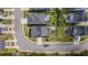 An aerial view shows the home, fenced-in backyard, and nearby streets in the neighborhood at 307 Morning Marsh Ln, Charleston, SC 29492